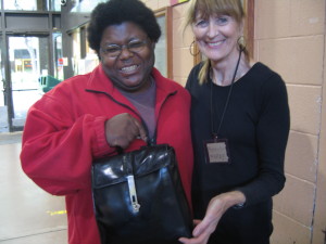 Mardy with a customer and her repaired purse